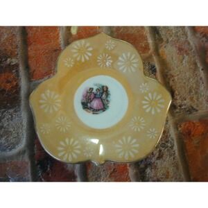 vintage Japan Stamped leaf shape saucer plate with man woman art estate find